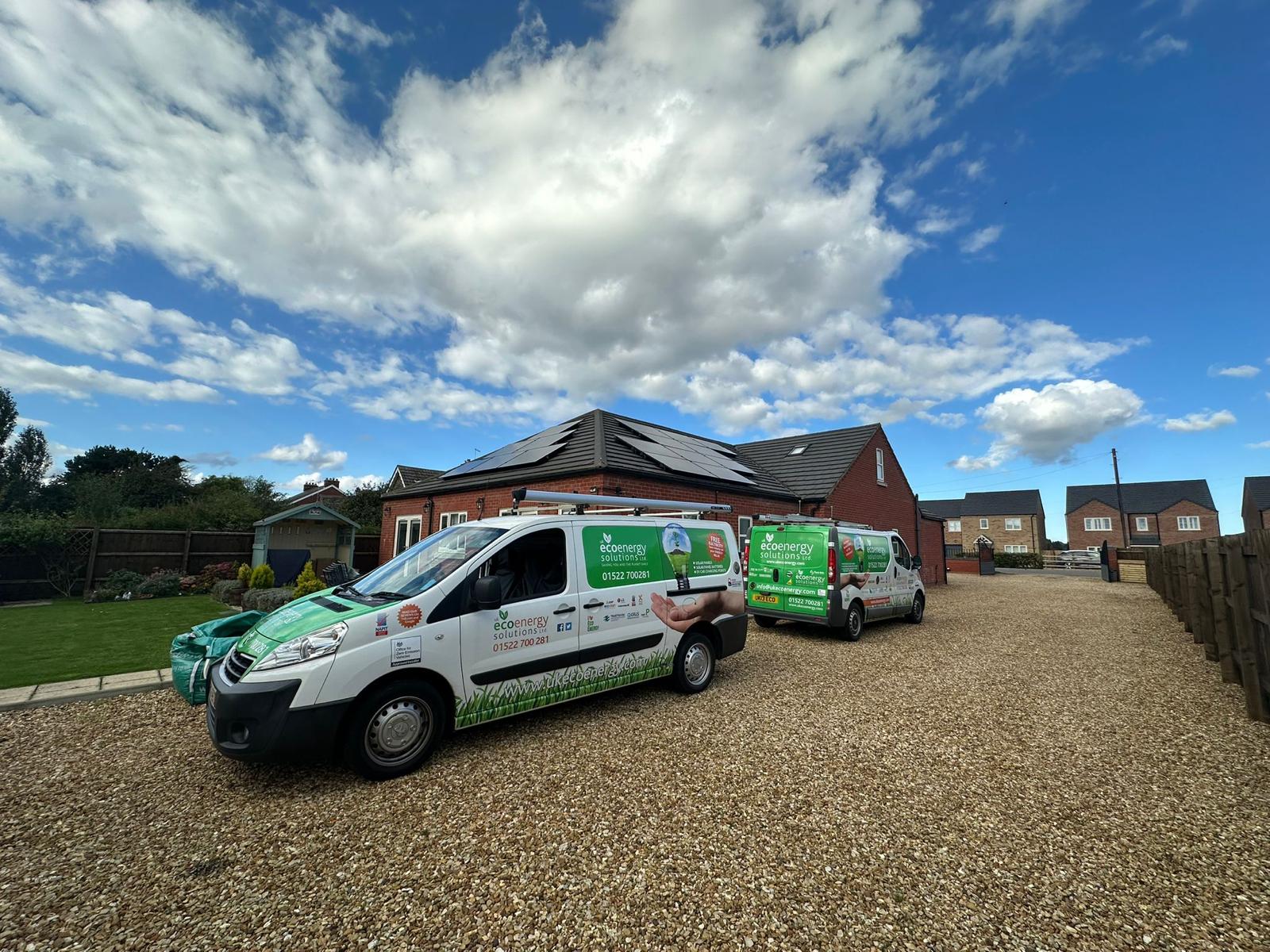 Qcells solar panels on a modern UK roof with sunny sky